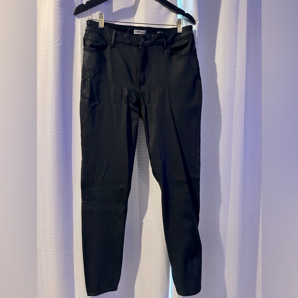 Shiny black women’s skinny jeans. Size 31